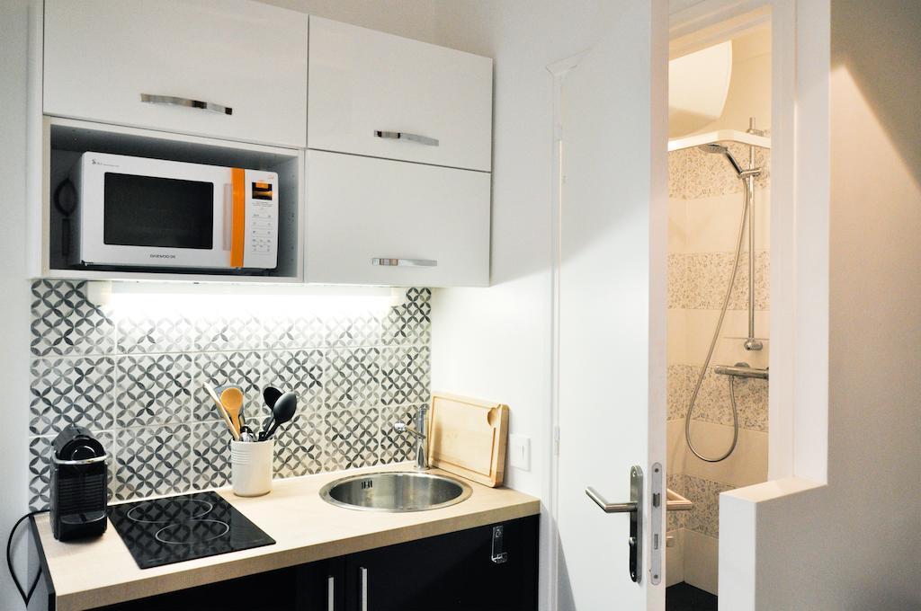 Duplex De Charme Au Coeur De Montmartre Apartment Париж Стая снимка