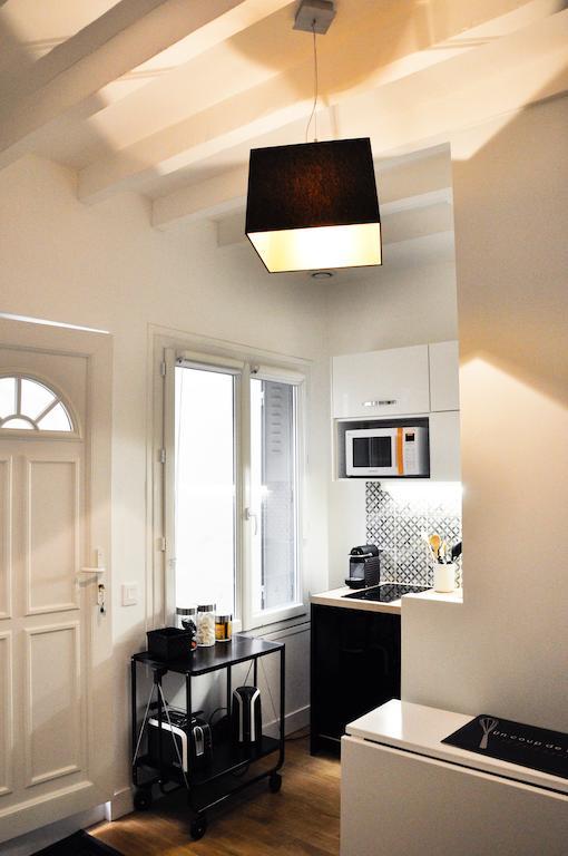 Duplex De Charme Au Coeur De Montmartre Apartment Париж Стая снимка
