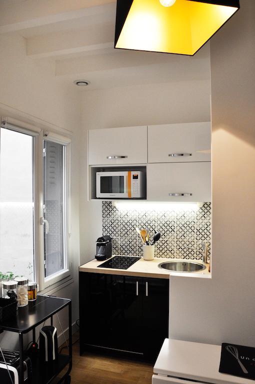 Duplex De Charme Au Coeur De Montmartre Apartment Париж Стая снимка