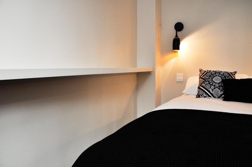 Duplex De Charme Au Coeur De Montmartre Apartment Париж Стая снимка