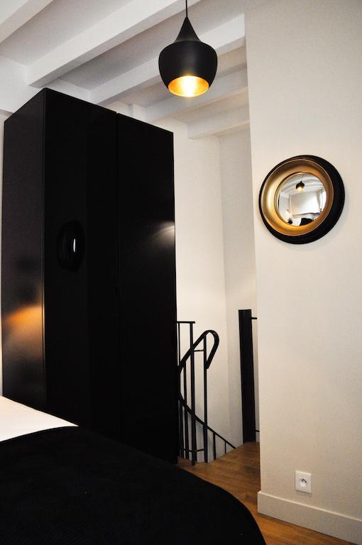 Duplex De Charme Au Coeur De Montmartre Apartment Париж Стая снимка
