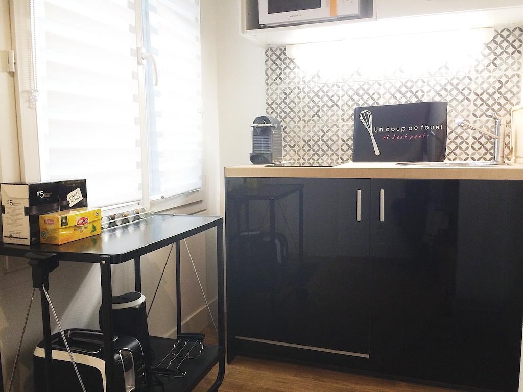Duplex De Charme Au Coeur De Montmartre Apartment Париж Стая снимка